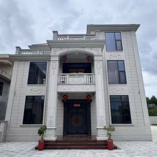 新疆 芝麻白石材别墅干挂案例展示